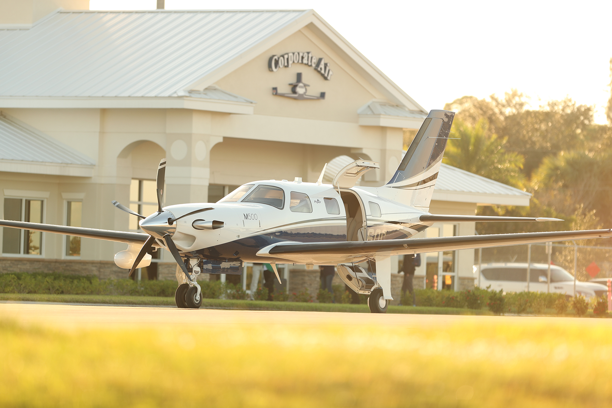 Piper M500 aircraft in front of the Corporate Air headquarters